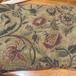 Fabric Upholstery beige background with rose colored flowers.  Chenille type